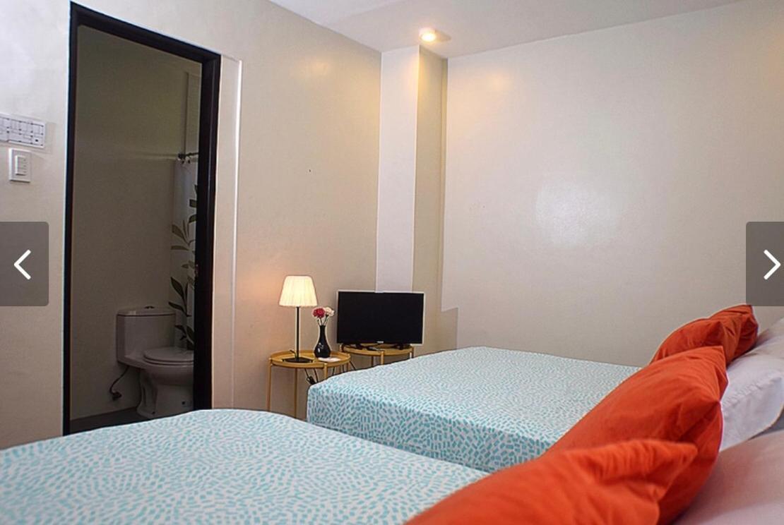 The Guest House Laoag Bagian luar foto